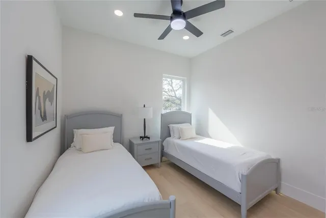 a view of a balcony with wooden floor