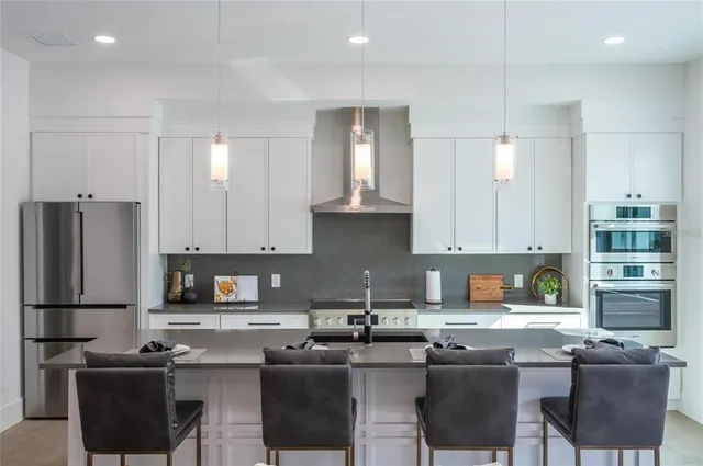 a living room with a couch and a flat screen tv