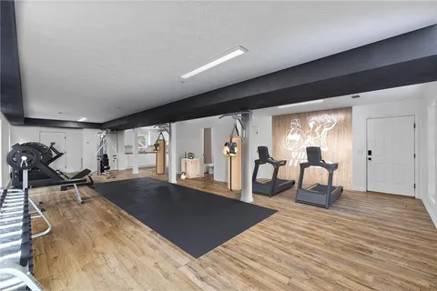 a view of house with a yard