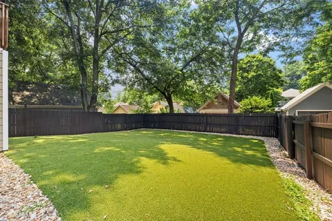 a view of a building with sitting area