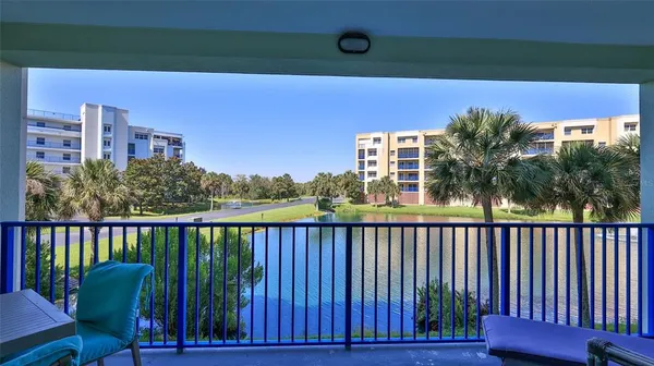 a view of a balcony with lake view