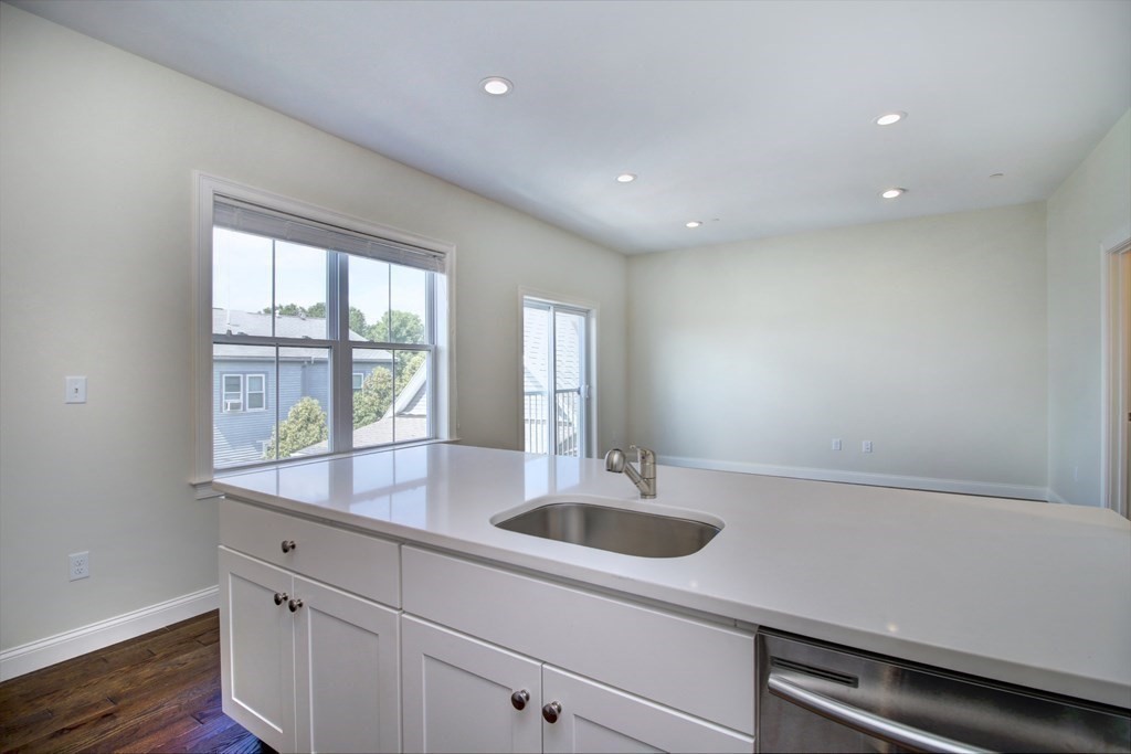 4 Kemp Street, Unit 4 Boston, MA 02127 - Photo 25 of 40 a kitchen with sink and window
