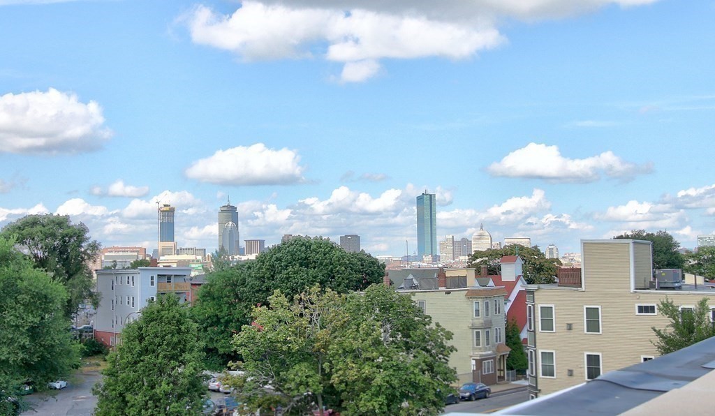 4 Kemp Street, Unit 4 Boston, MA 02127 - Photo 5 of 40 a view of a city with tall buildings