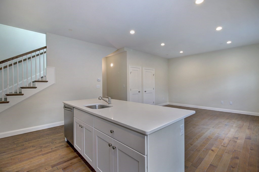 4 Kemp Street, Unit 4 Boston, MA 02127 - Photo 8 of 40 a bathroom with a sink and a mirror
