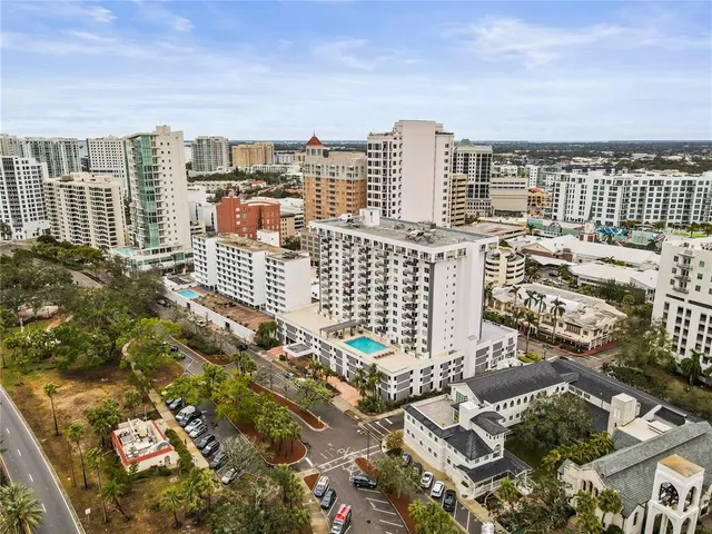 a view of city with tall buildings