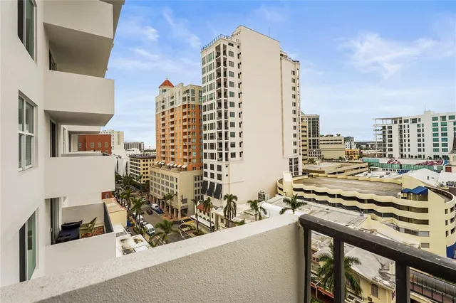 a kitchen with stainless steel appliances granite countertop a sink and a counter space