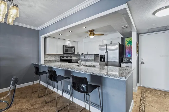 a bathroom with a toilet and a bathtub