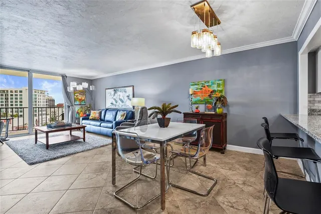 a view of a living room and entryway