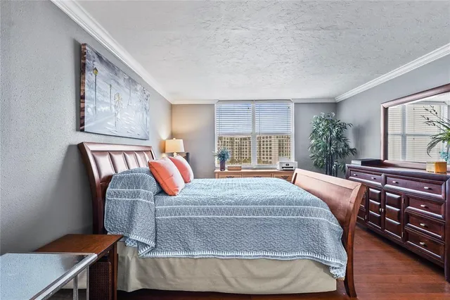 a view of swimming pool with chairs