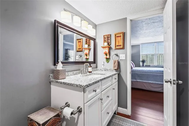 a view of swimming pool with a chairs