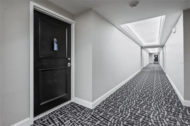 a view of a balcony with chairs