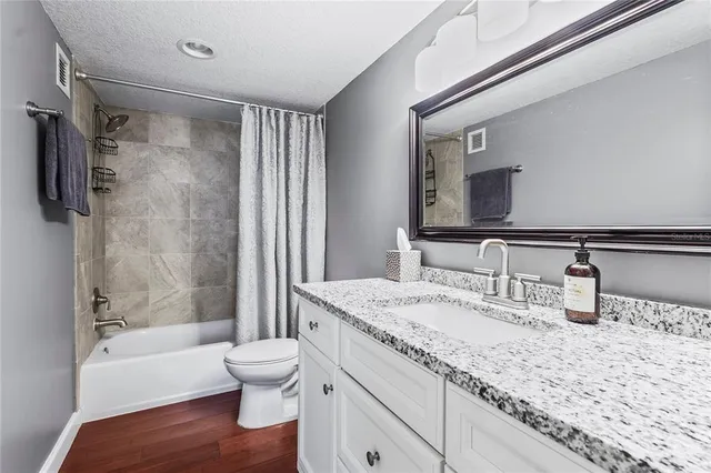 a view of a swimming pool with a terrace