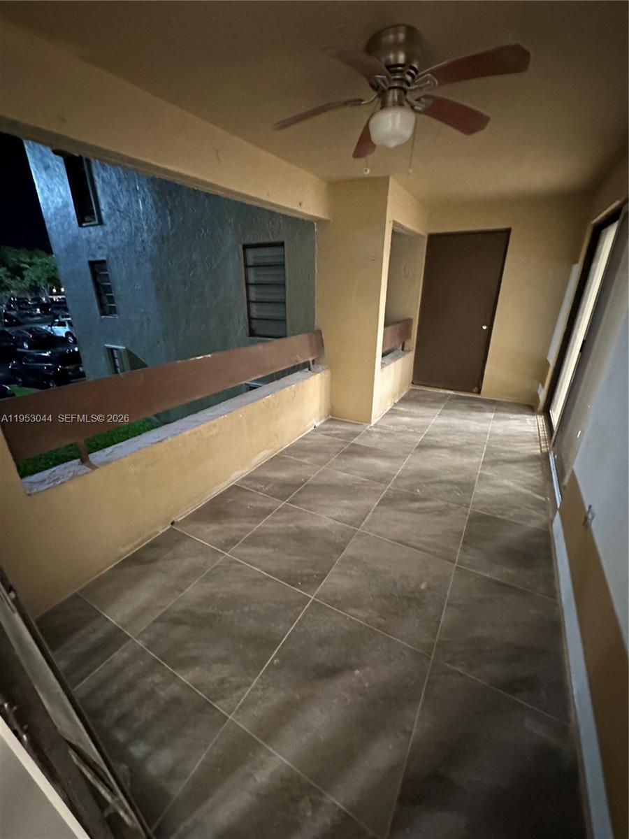 9015 Southwest 125th Avenue, Unit N209 Miami, FL 33186 - Photo 12 of 18 a view of an empty room