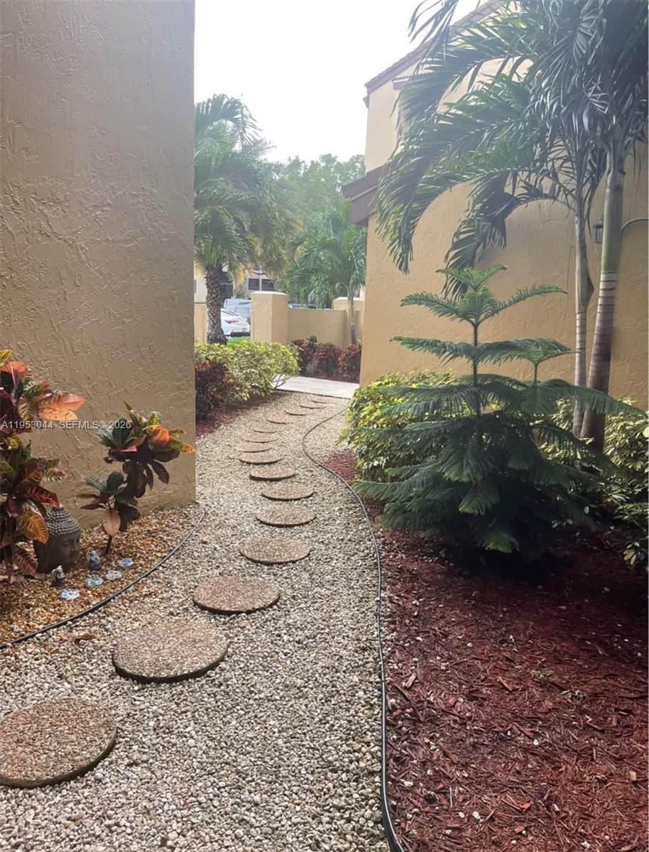 9015 Southwest 125th Avenue, Unit N209 Miami, FL 33186 - Photo 14 of 18 a view of a outdoor space