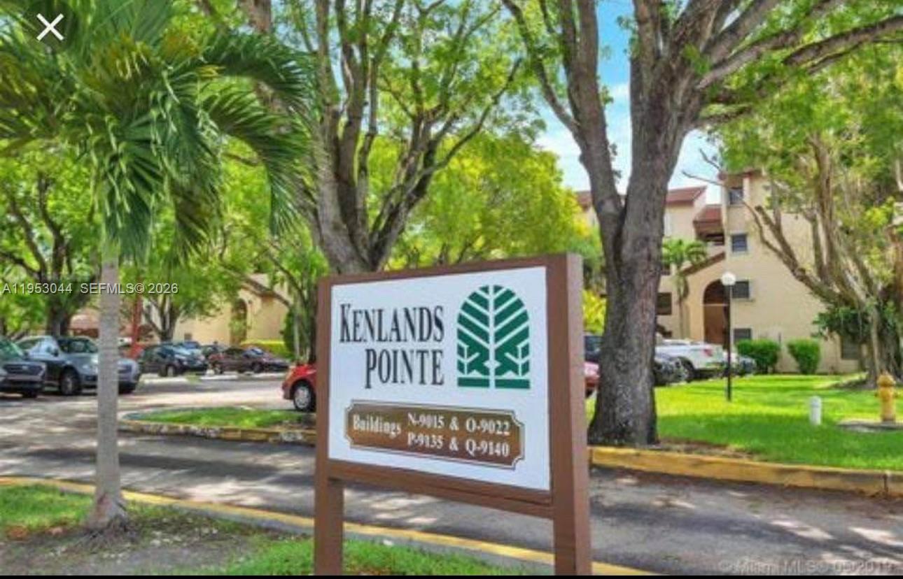 9015 Southwest 125th Avenue, Unit N209 Miami, FL 33186 - Photo 16 of 18 a sign on the side of the road