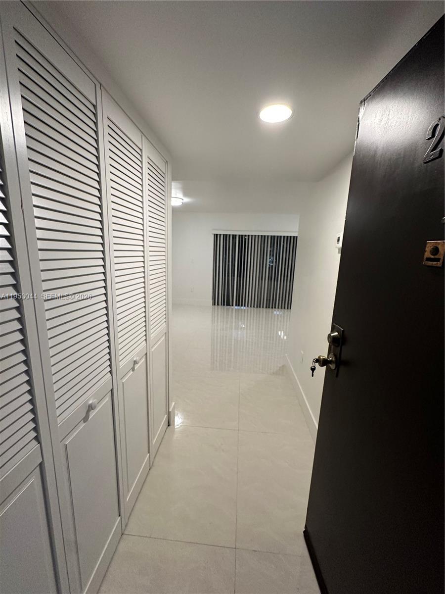 9015 Southwest 125th Avenue, Unit N209 Miami, FL 33186 - Photo 3 of 18 en suite bathroom with a shower