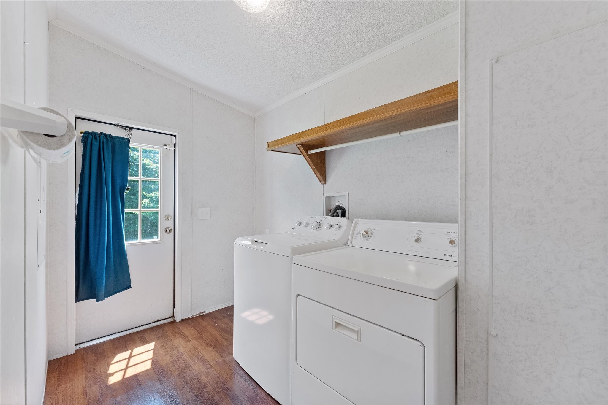 23419 Quiet Hollow Road Montgomery, TX 77356 - Photo 14 of 46 a utility room with dryer and washer