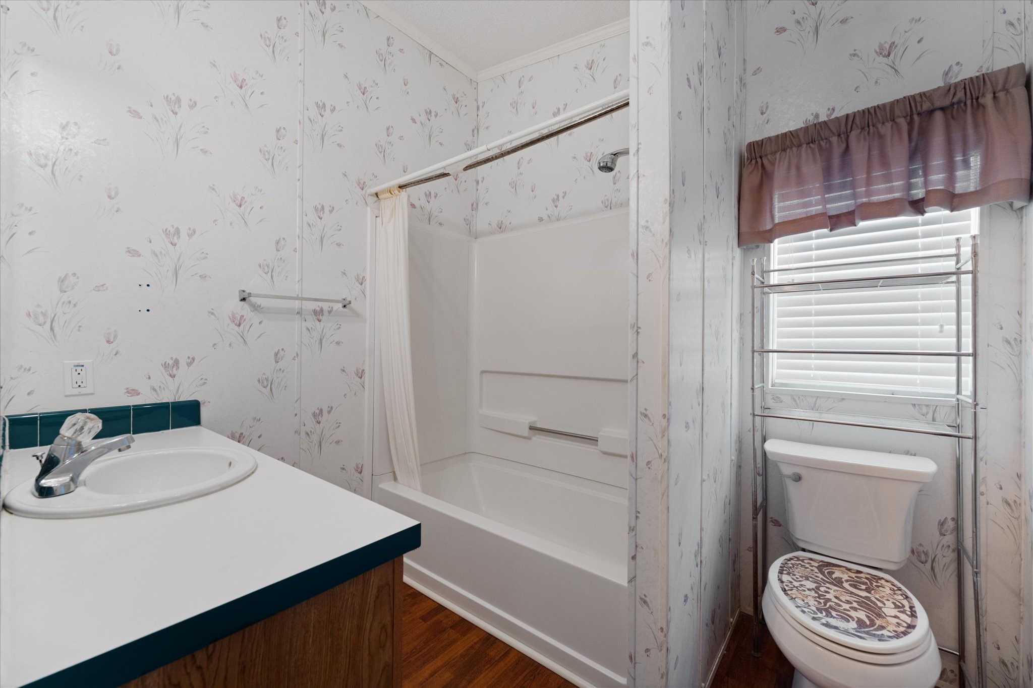 23419 Quiet Hollow Road Montgomery, TX 77356 - Photo 18 of 46 a bathroom with a sink a toilet and shower