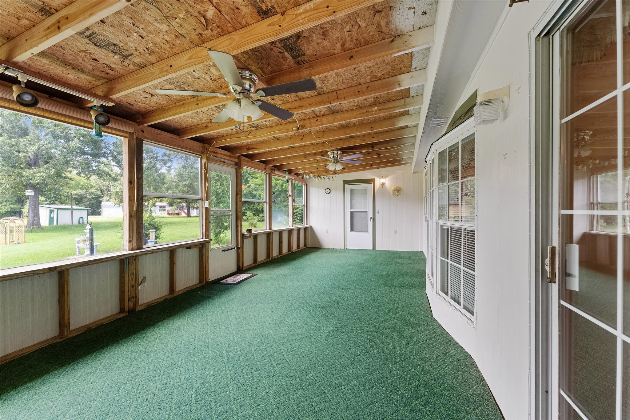 23419 Quiet Hollow Road Montgomery, TX 77356 - Photo 21 of 46 a view of an empty room with a large window
