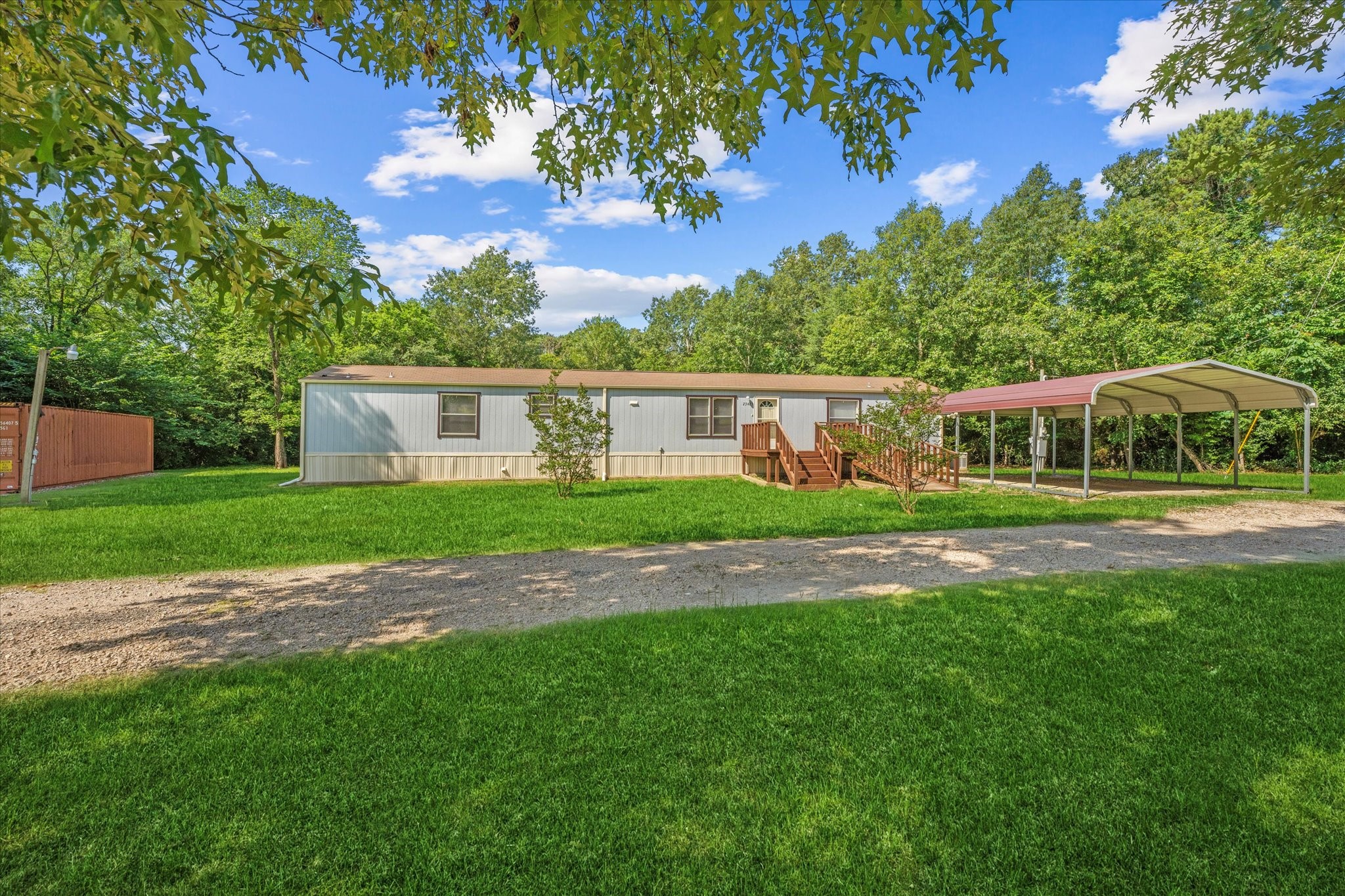 23419 Quiet Hollow Road Montgomery, TX 77356 - Photo 22 of 46 a front view of house with yard and green space