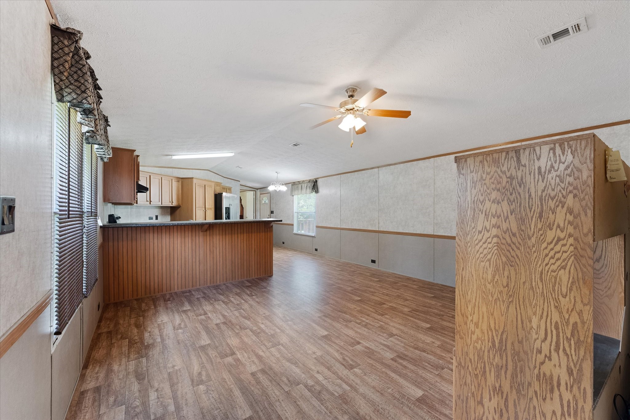 23419 Quiet Hollow Road Montgomery, TX 77356 - Photo 24 of 46 a view of kitchen with furniture and wooden floor