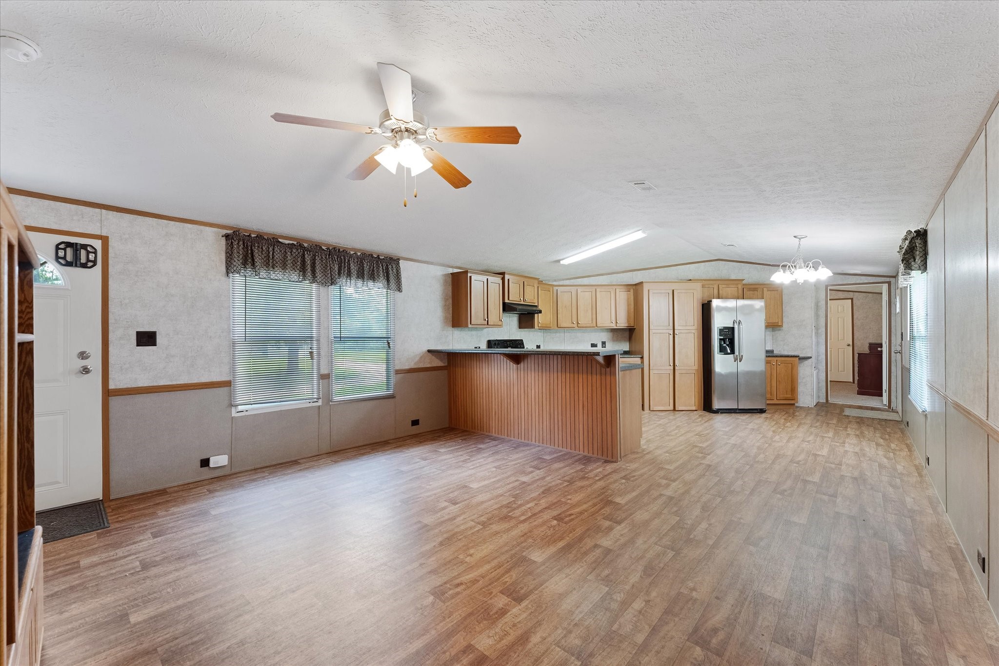 23419 Quiet Hollow Road Montgomery, TX 77356 - Photo 25 of 46 a view of a kitchen with a sink and a window