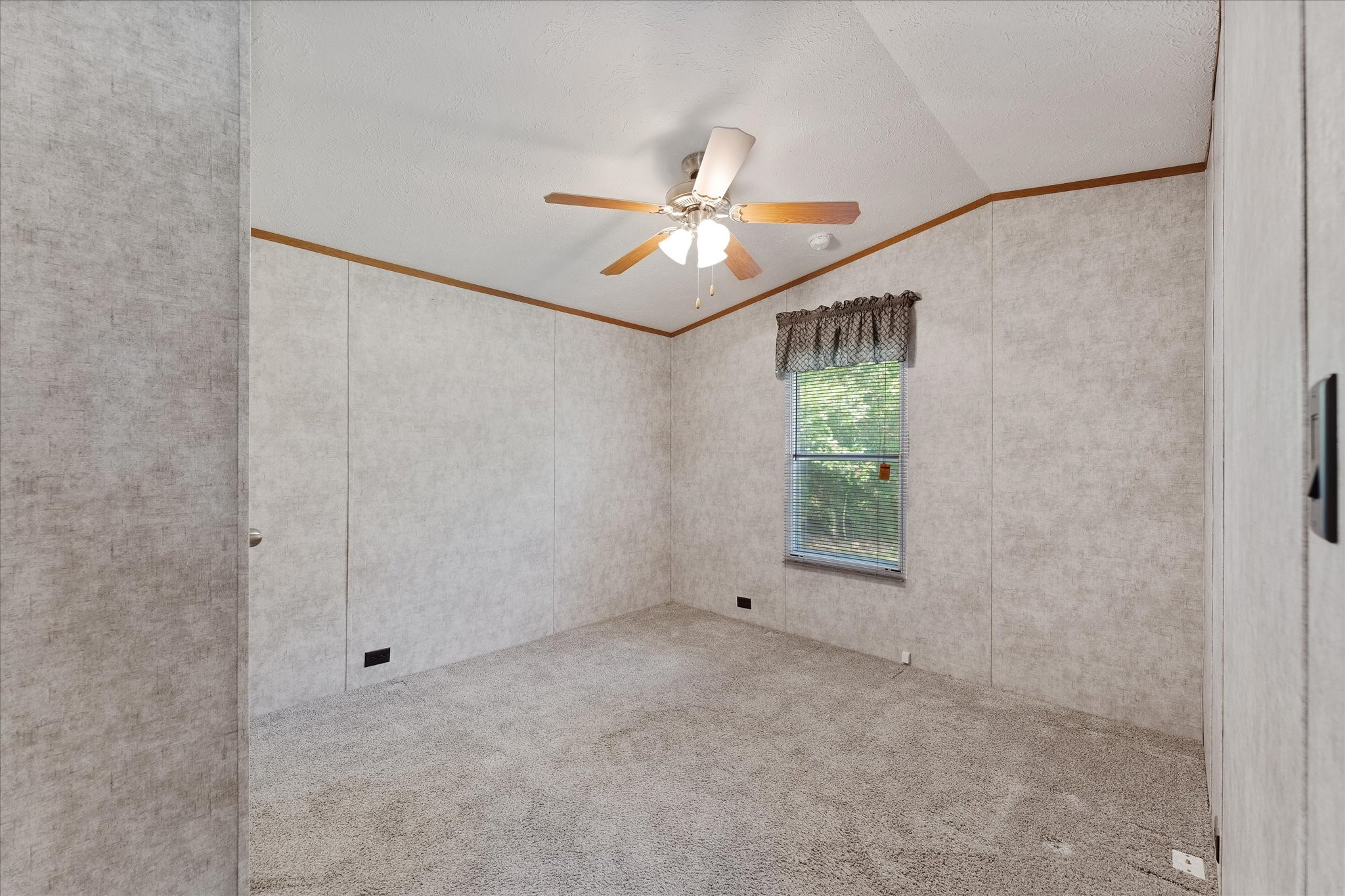 23419 Quiet Hollow Road Montgomery, TX 77356 - Photo 30 of 46 a view of an empty room with a window