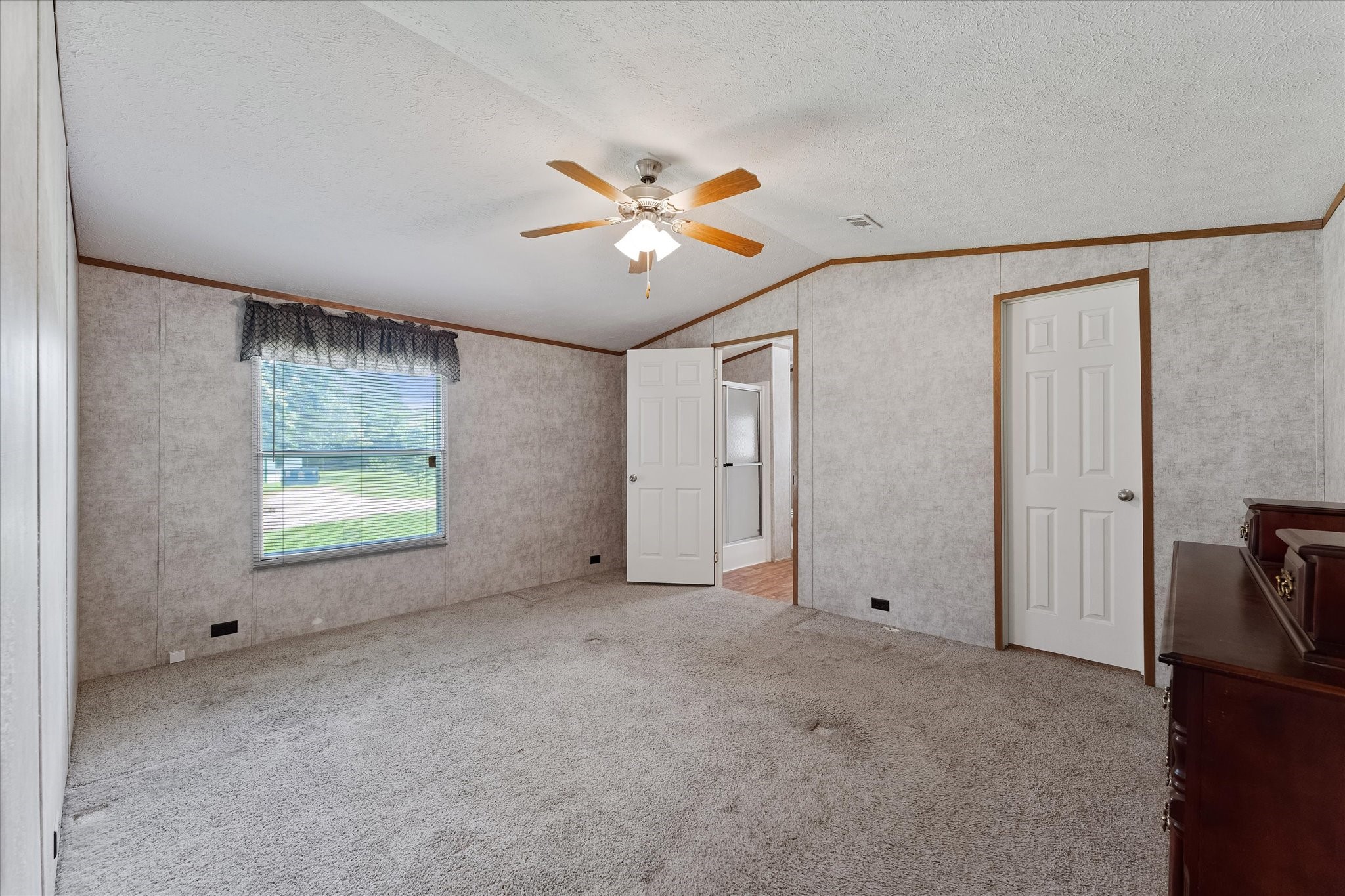 23419 Quiet Hollow Road Montgomery, TX 77356 - Photo 32 of 46 a view of an empty room with a window