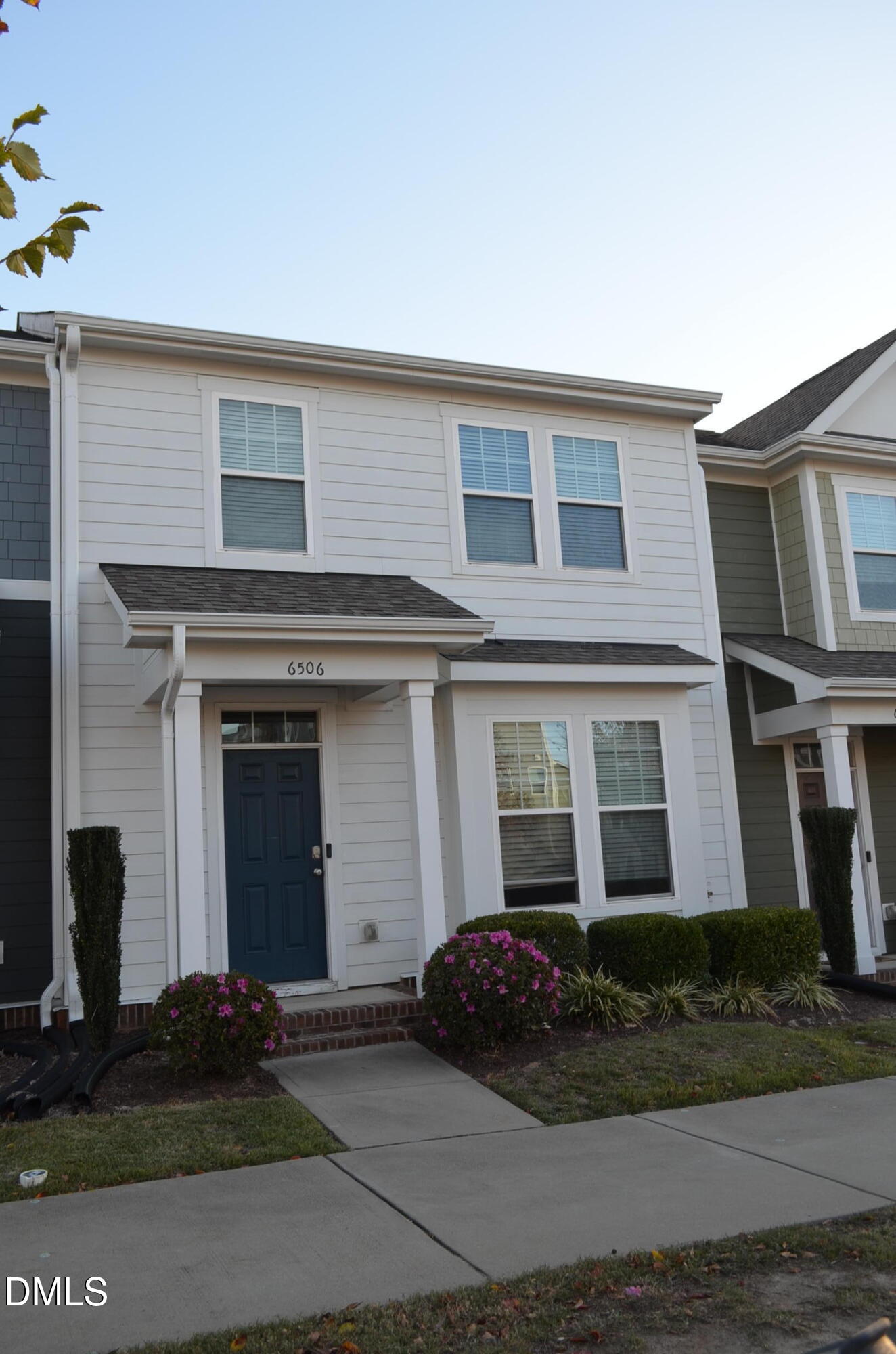 6506 Perry Creek Road, Unit 1103 Raleigh, NC 27616 - Photo 1 of 34 a house that has a window in it