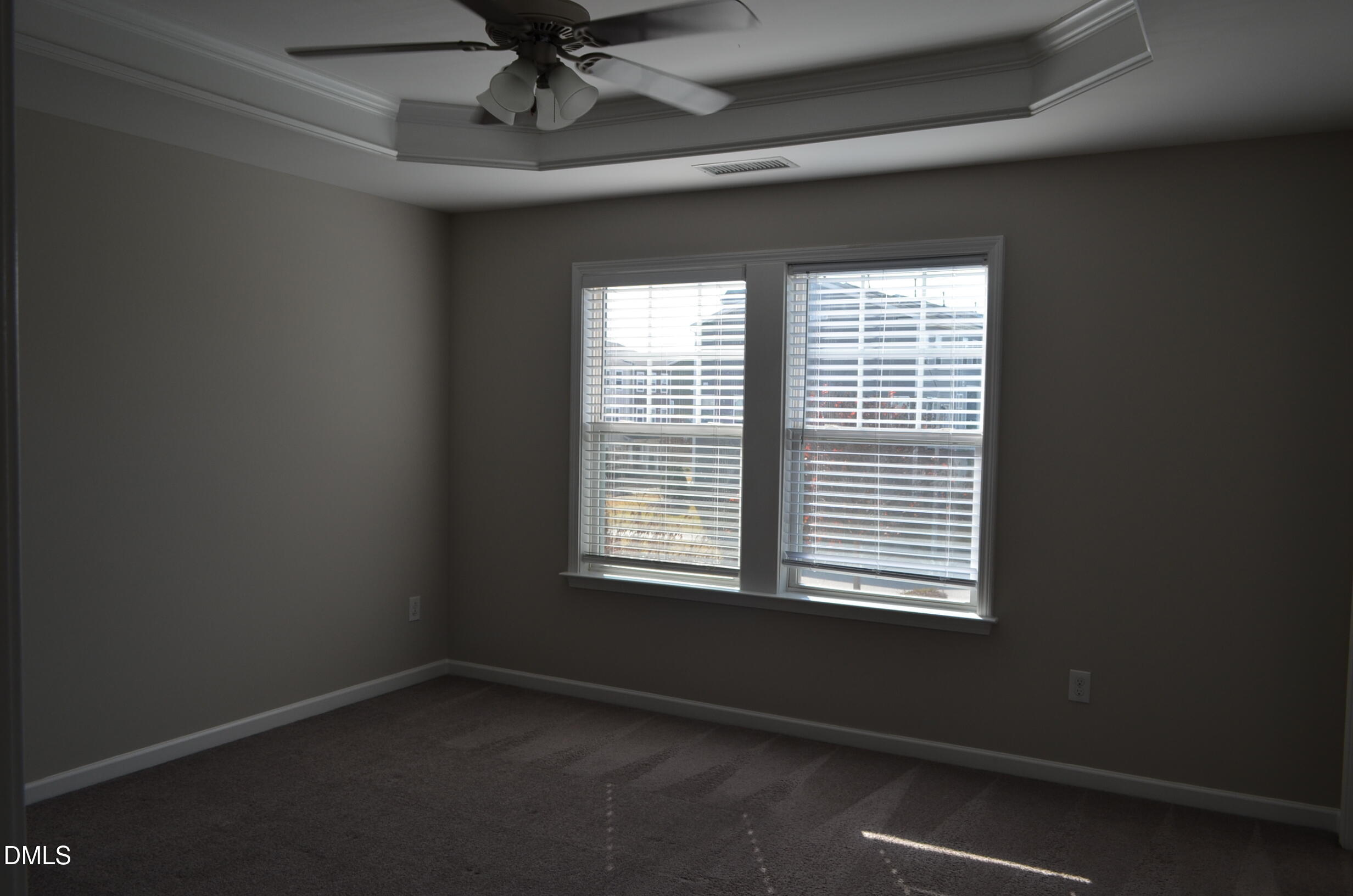 6506 Perry Creek Road, Unit 1103 Raleigh, NC 27616 - Photo 25 of 34 a view of an empty room with a window