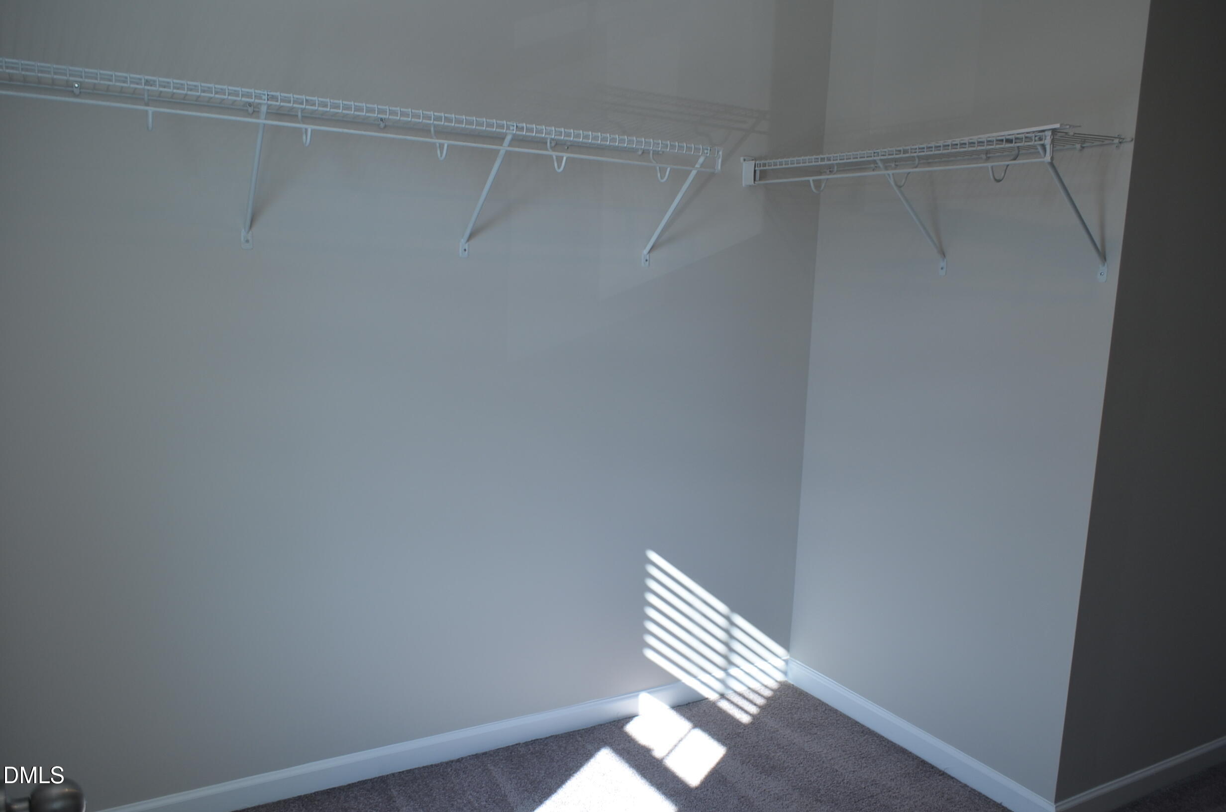 6506 Perry Creek Road, Unit 1103 Raleigh, NC 27616 - Photo 29 of 34 a view of wooden floor in a small room