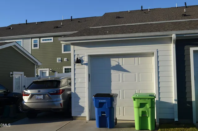 a car parked in front of a house