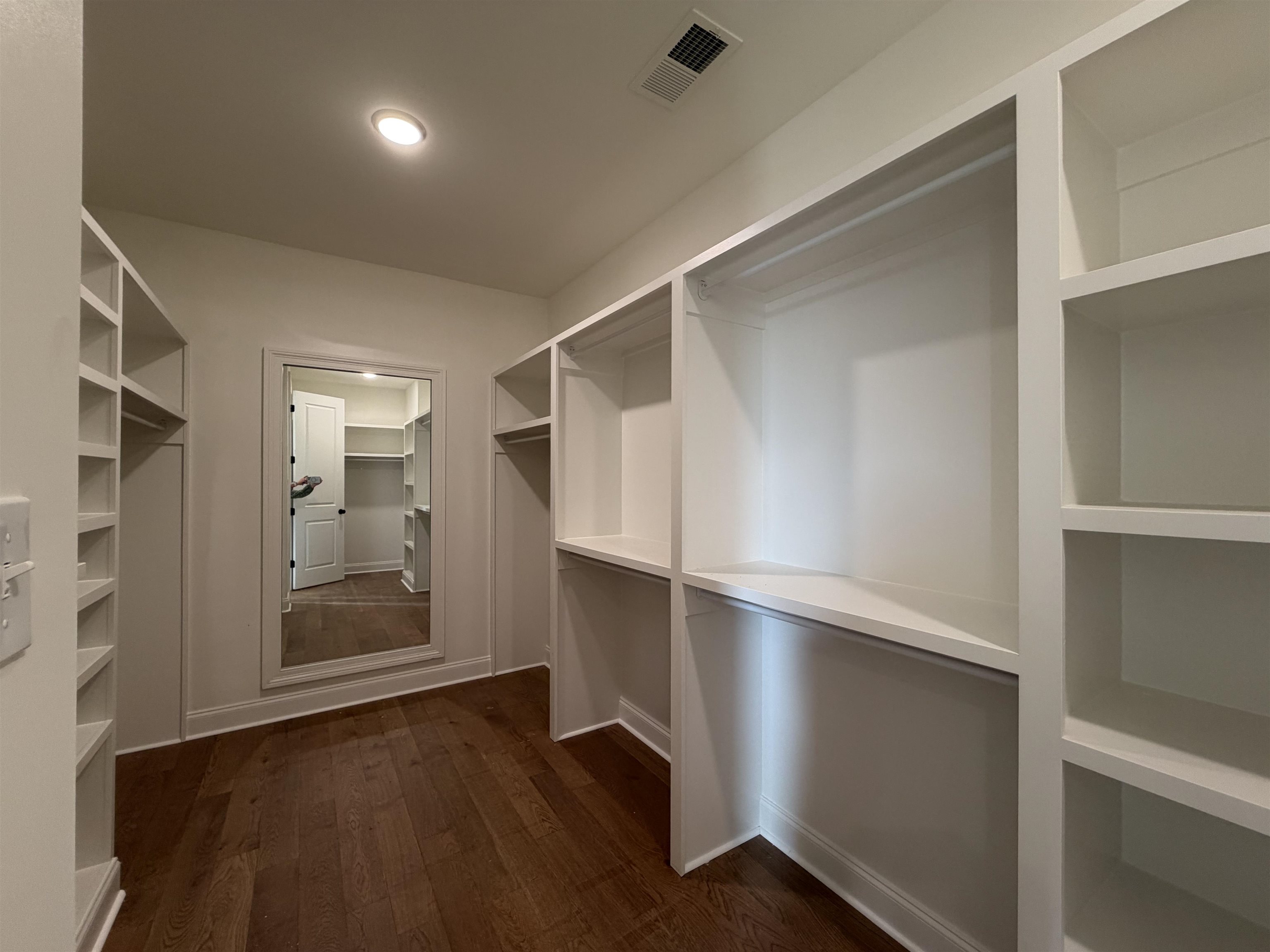 190 Rambling Rex Trail Piperton, TN 38017 - Photo 17 of 32 a view of an empty room with wooden floor and a window