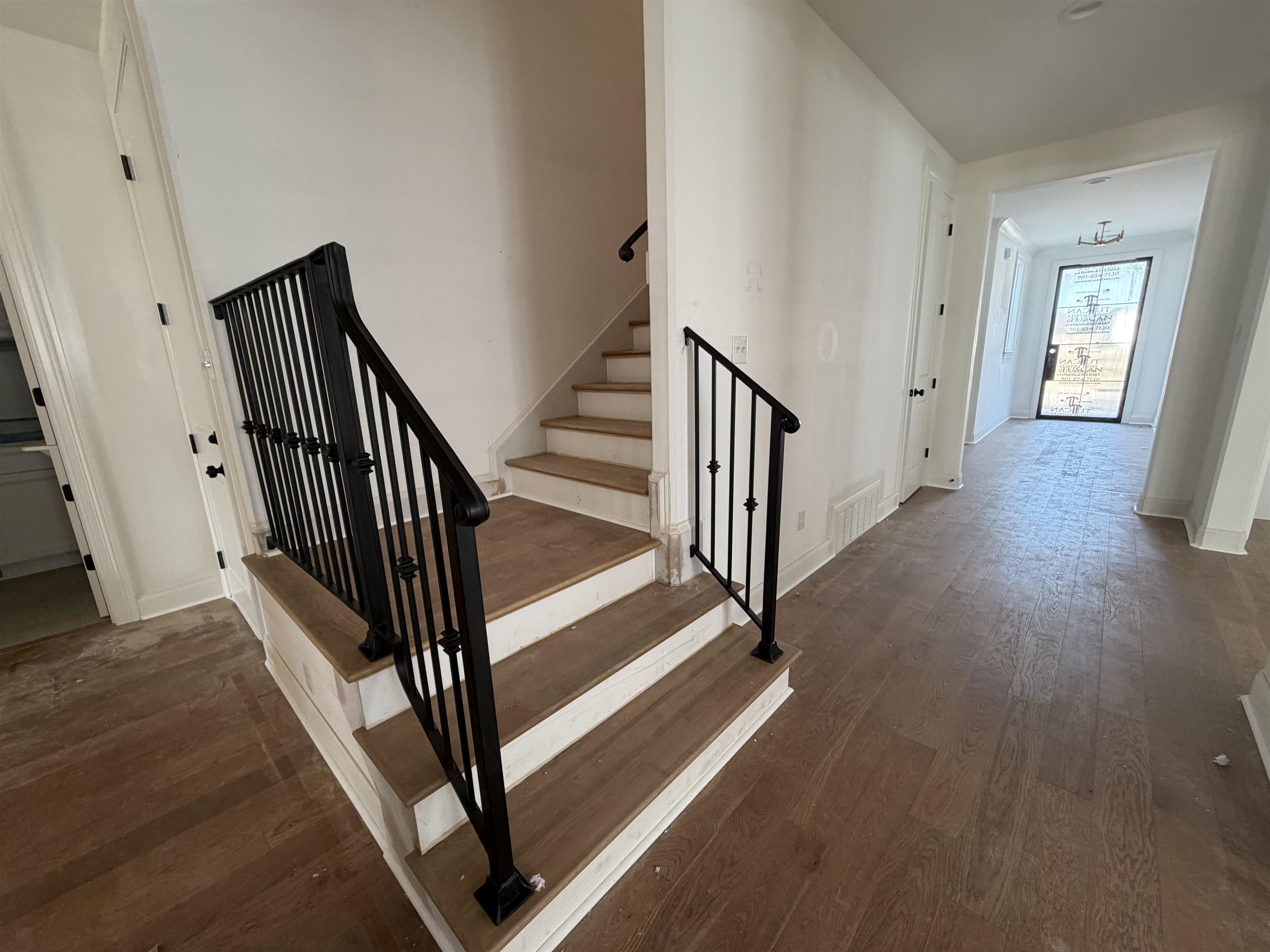 190 Rambling Rex Trail Piperton, TN 38017 - Photo 3 of 32 a view of a hallway with wooden floor and staircase