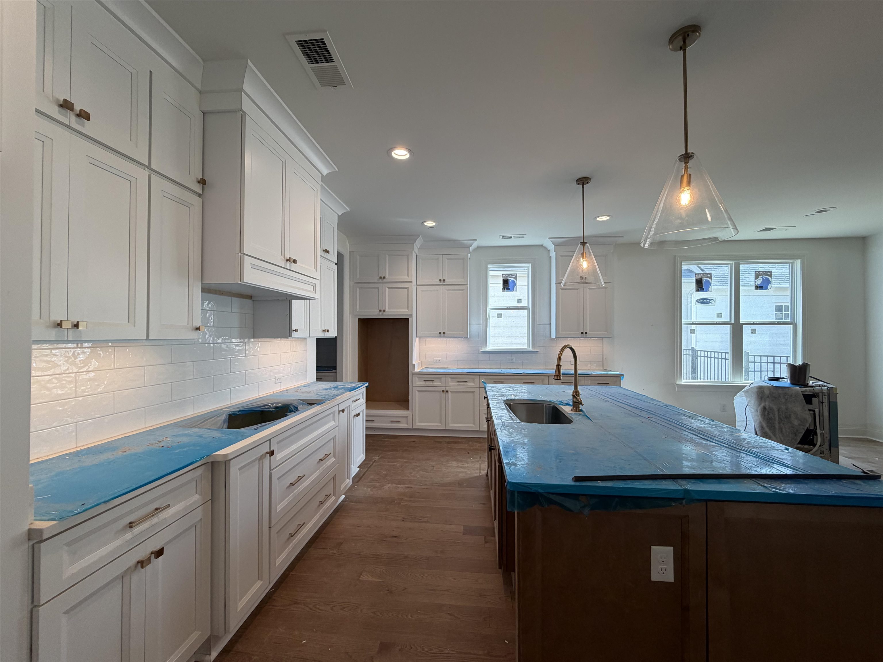 190 Rambling Rex Trail Piperton, TN 38017 - Photo 6 of 32 a kitchen with counter space sink and stove