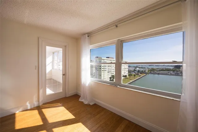 a view of an empty room with a window