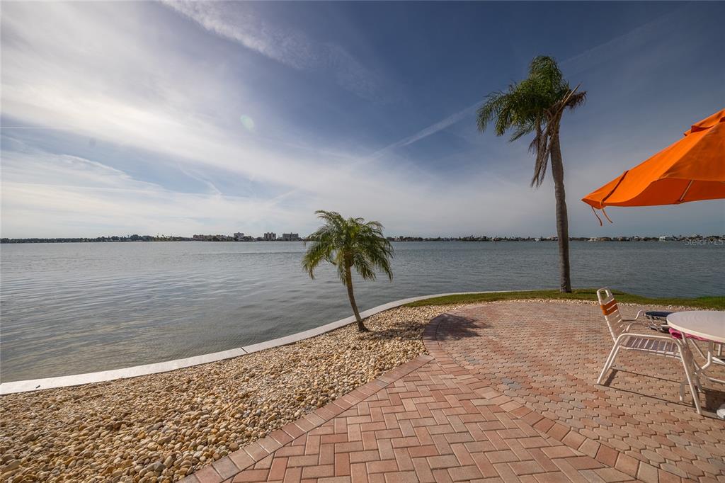 4775 Cove Circle, Unit 1002 Madeira Beach, FL 33708 - Photo 39 of 60 a view of a lake