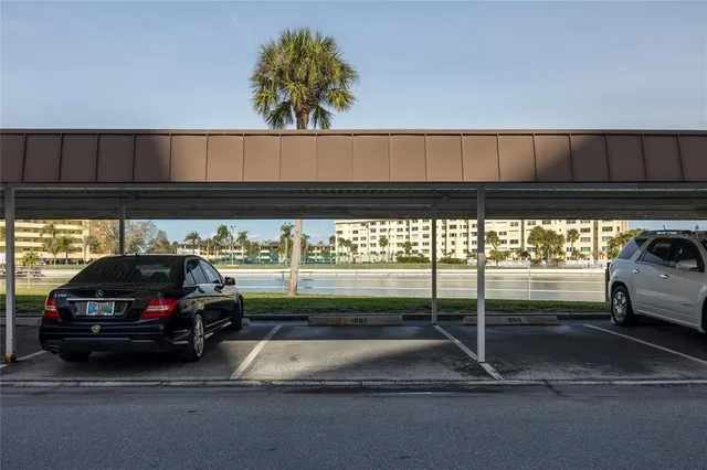 a front view of a building with sign board