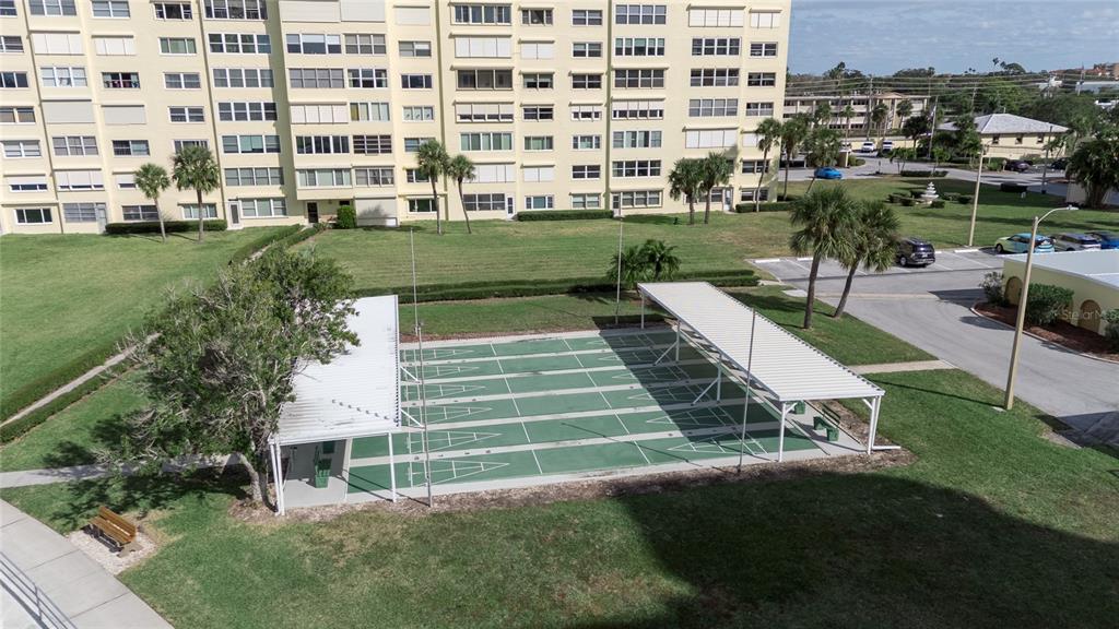 4775 Cove Circle, Unit 1002 Madeira Beach, FL 33708 - Photo 45 of 60 a view of a large building