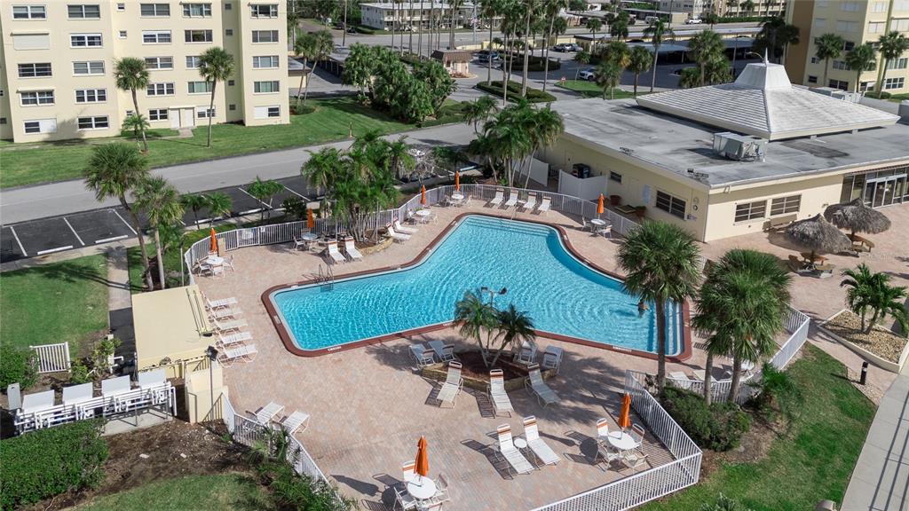 4775 Cove Circle, Unit 1002 Madeira Beach, FL 33708 - Photo 47 of 60 an aerial view of a house with outdoor space