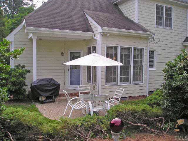 4413 Knightsbridge Way Raleigh, NC 27604 - Photo 10 of 10 Covered porch and aggregate stone patio off the kitchen Other