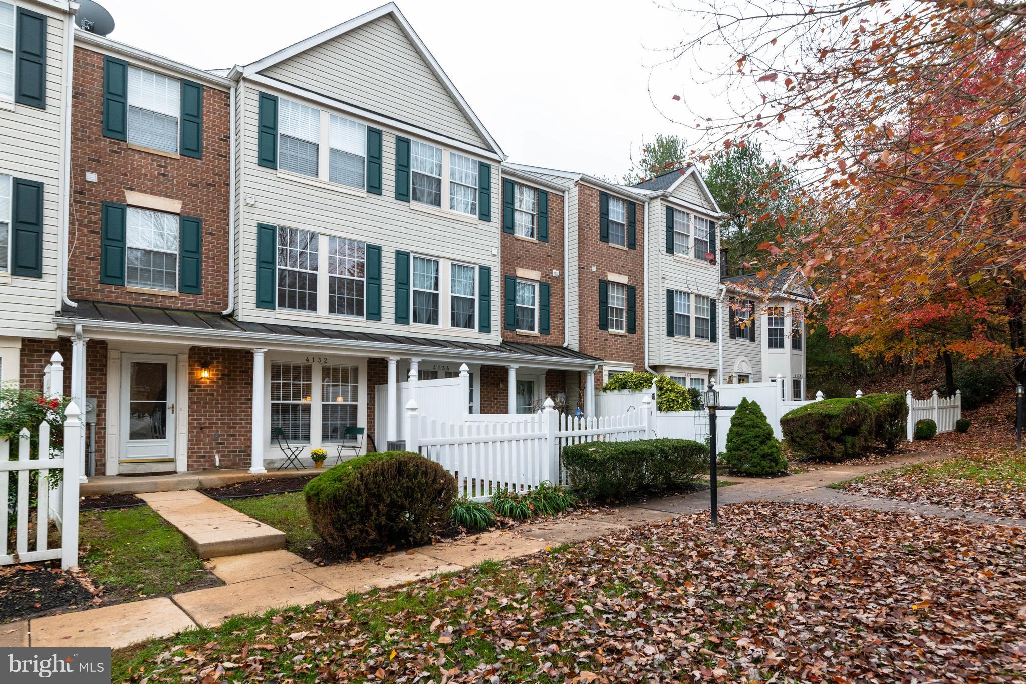 4132 Maple Path Circle, Unit 61 Baltimore, MD 21236 - Photo 1 of 47 a view of a building with a garden