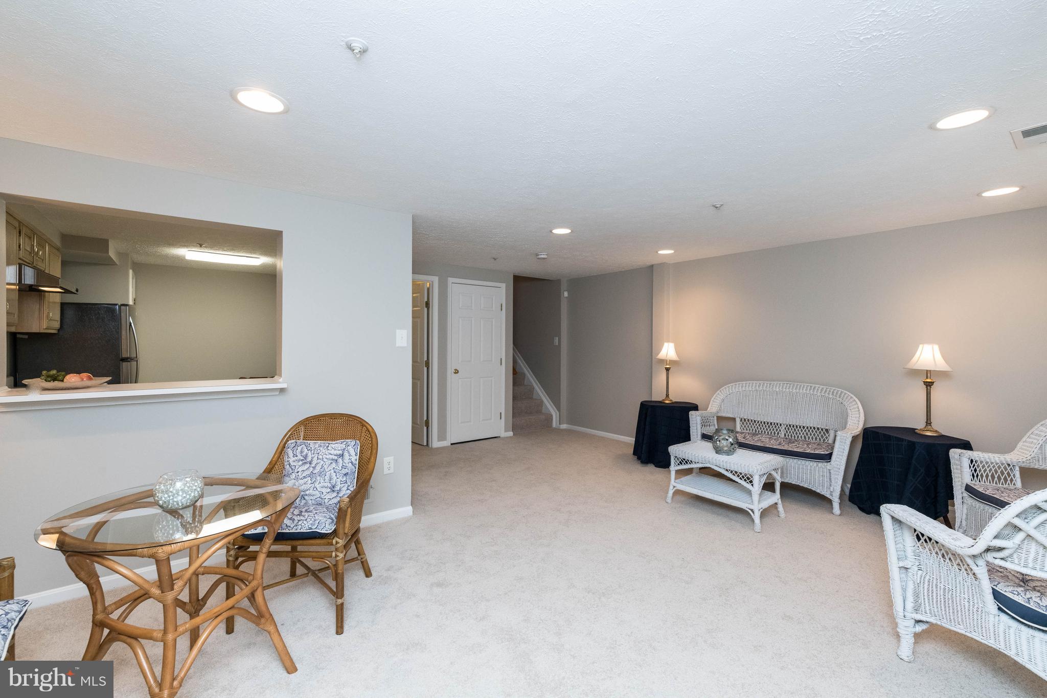4132 Maple Path Circle, Unit 61 Baltimore, MD 21236 - Photo 12 of 47 a bedroom with furniture and a mirror