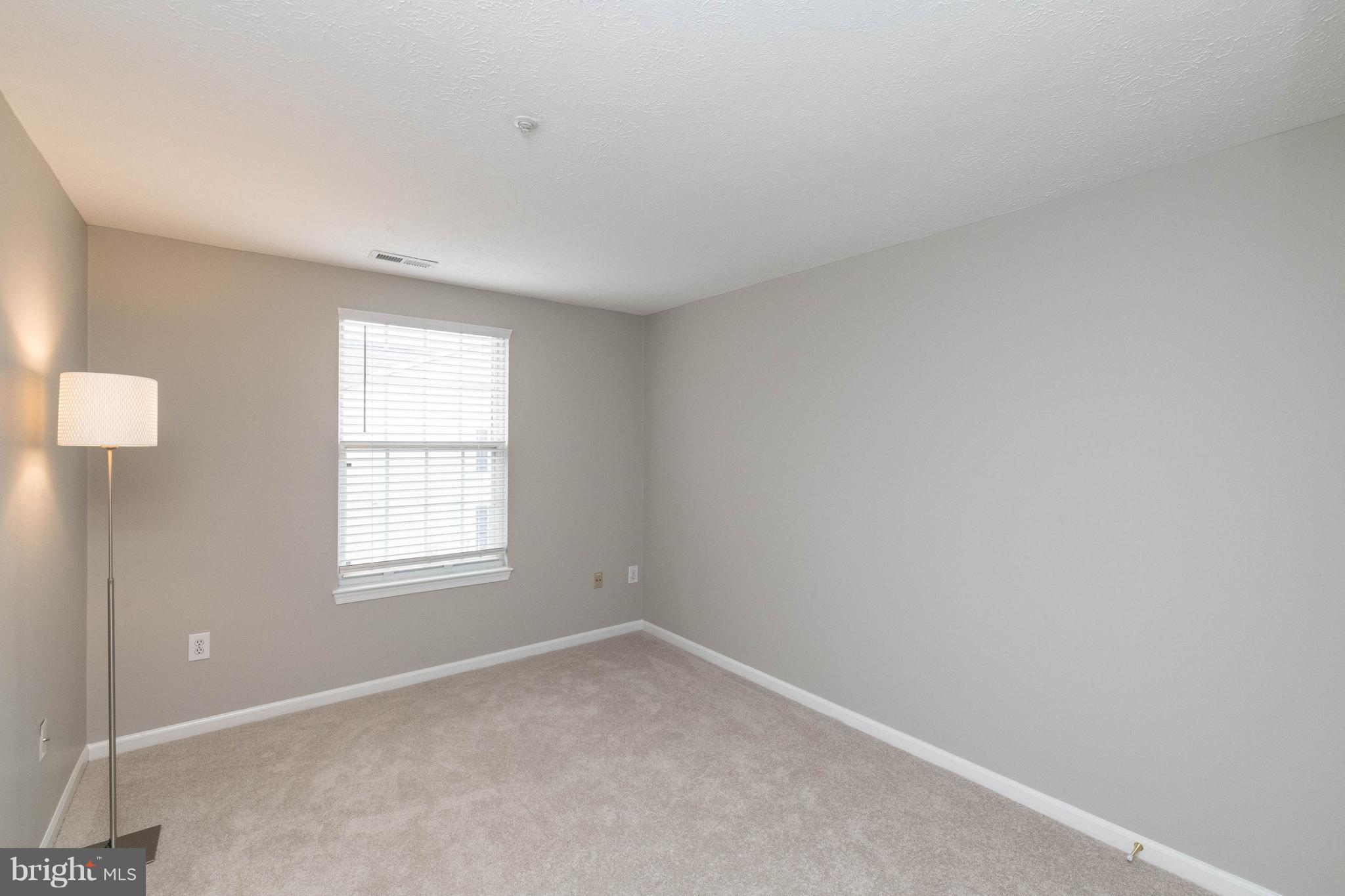 4132 Maple Path Circle, Unit 61 Baltimore, MD 21236 - Photo 26 of 47 an empty room with a window