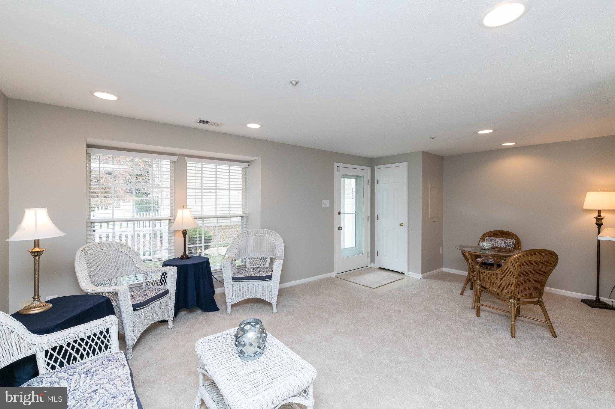 4132 Maple Path Circle, Unit 61 Baltimore, MD 21236 - Photo 6 of 47 a living room with furniture and a window
