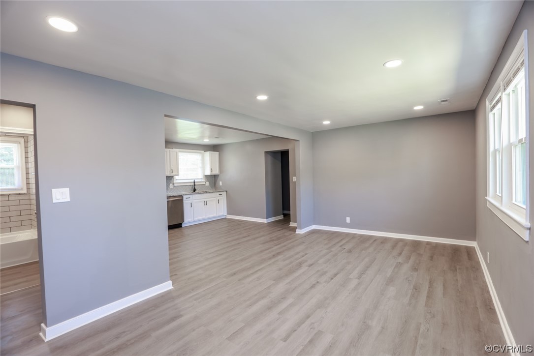 3309 Croydon Road Richmond, VA 23223 - Photo 4 of 21 Unfurnished living room featuring light hardwood f