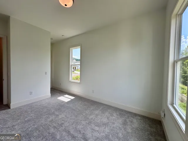 an empty room with windows