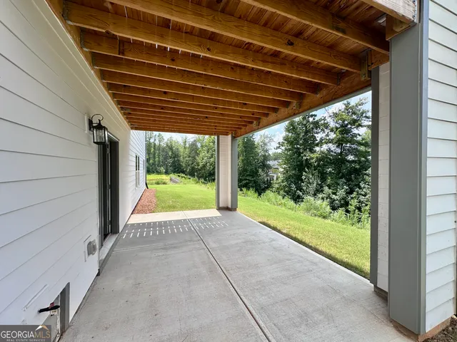 a view of porch with a backyard