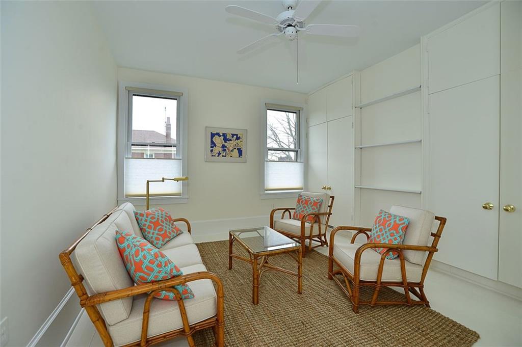 304 Bower Hill Road Pittsburgh, PA 15228 - Photo 18 of 25 Bedroom 3 is sunlit by two windows, and features custom built in closets and paddle fan. High ceilings add volume to the room.