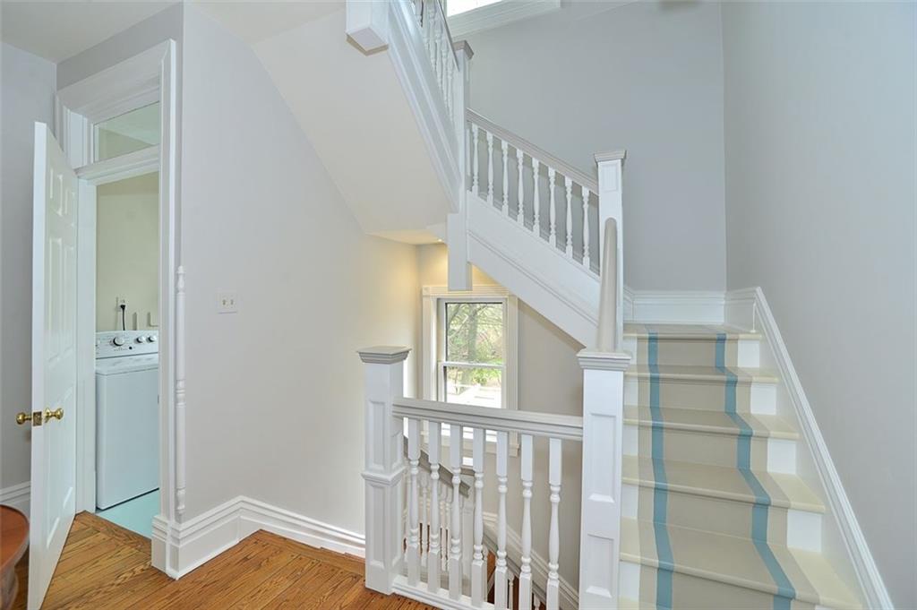 304 Bower Hill Road Pittsburgh, PA 15228 - Photo 19 of 25 The open stair case expands to the third floor which is completely finished. The generously sized laundry room is perfectly and conveniently located off the hall at the top of the steps.